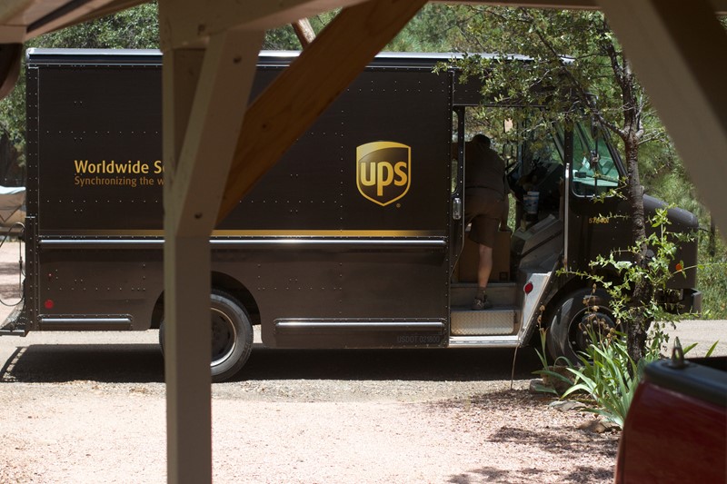 UPS truck picking up shipments from gentilly mail and copy center store